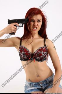 Nina Sitting Pose With Pistol Pose 